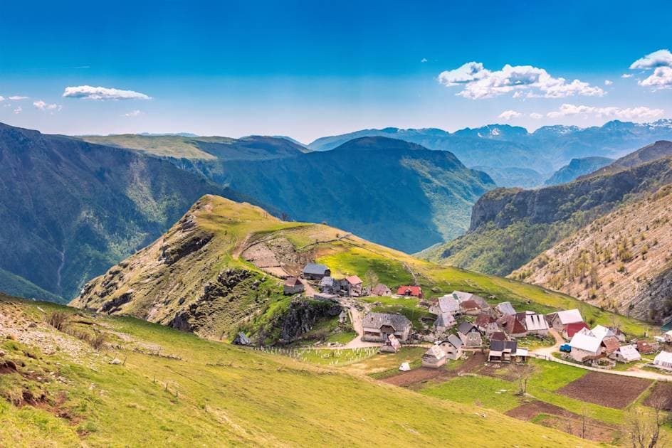 Highland meadows and the houses of Lukomir on the rim of the Rakitnica canyon, Bjelašnica